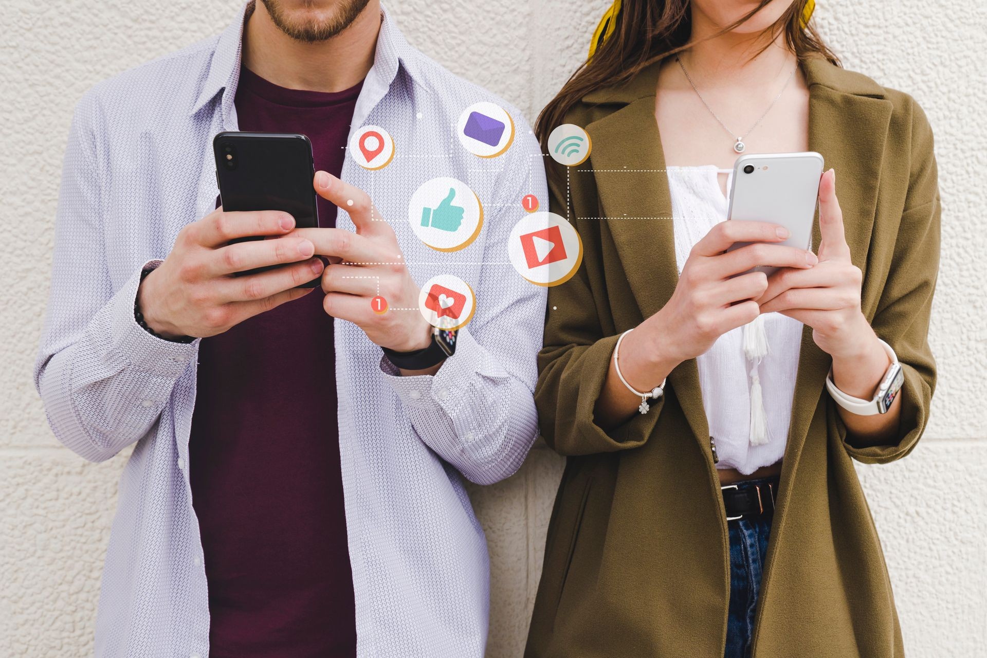 Two people using smartphones with social media notification icons around them.